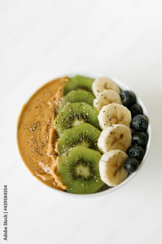 Smoothie Bowl Chia Seed Pudding Fruit Bowl White Table Flatlay Shot Vegan Healthy Blueberry Kiwi Peanut Butter Dessert Bowl Smoothie Bowl Chia Seed Pudding Fruit Bowl White Table Flatlay Shot Vegan Healthy Blueberry Kiwi Peanut Butter Dessert Bowl