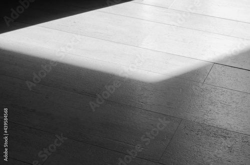 The picture of sunlight shining into the floor in the morning.