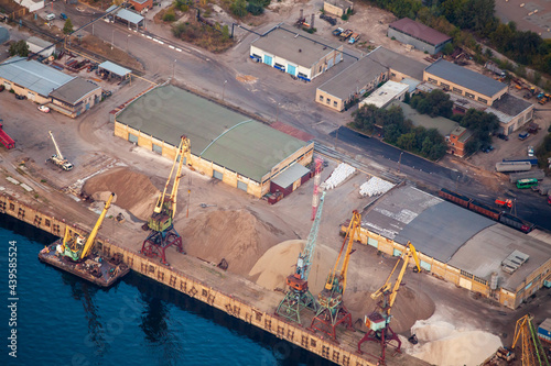 Cargo port with tower cranes for loading sand