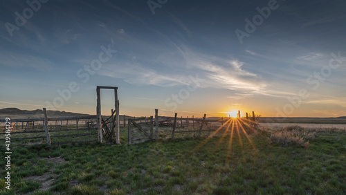 Setting sun on an old corral in Grasslands National Park, Saskatchewan, Canada