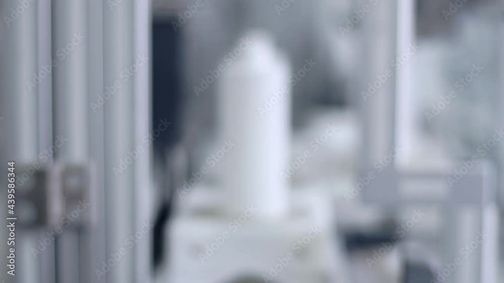 White plastic bottle on the conveyor. Clip. High technology Plastic bottle manufacturing industrial, Raw material plastic bottle production, precision plastic bottle blow method. 4K White plastic bottle on the conveyor. Clip. High technology Plastic bottle manufacturing industrial, Raw material plastic bottle production, precision plastic bottle blow method. 4K