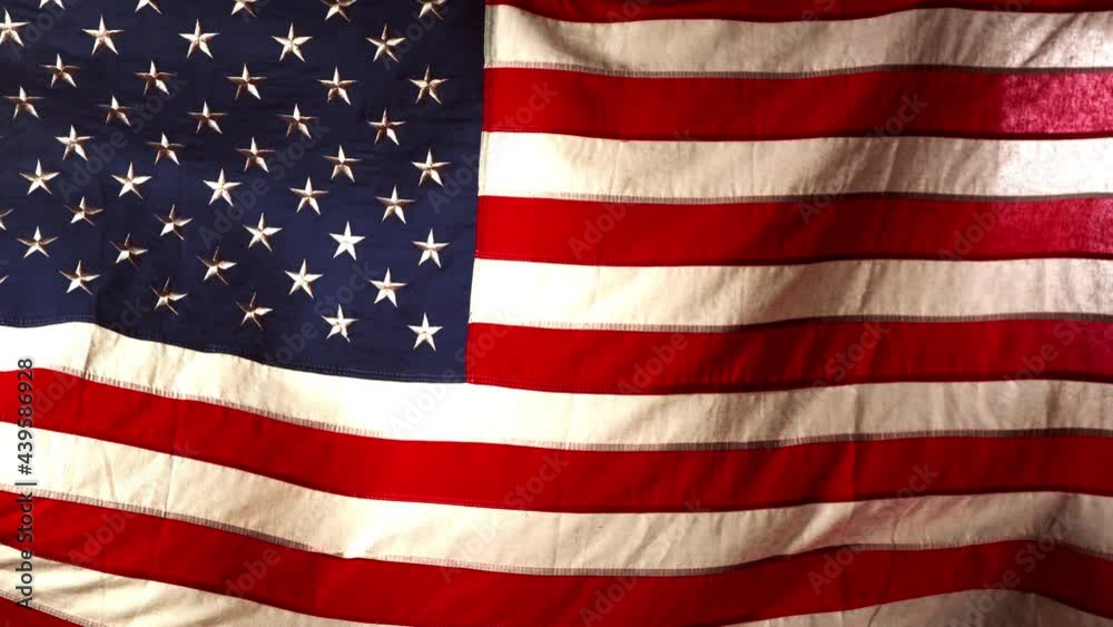 Super slow motion of waving flag of USA in close-up. Filmed on high speed cinema camera, 1000fps.