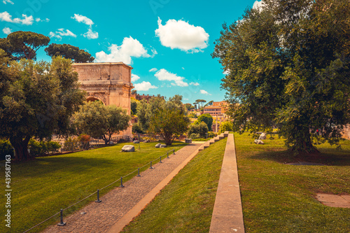 Roman roads upon the Palatine Hill with beautiful view on Coliseum in background