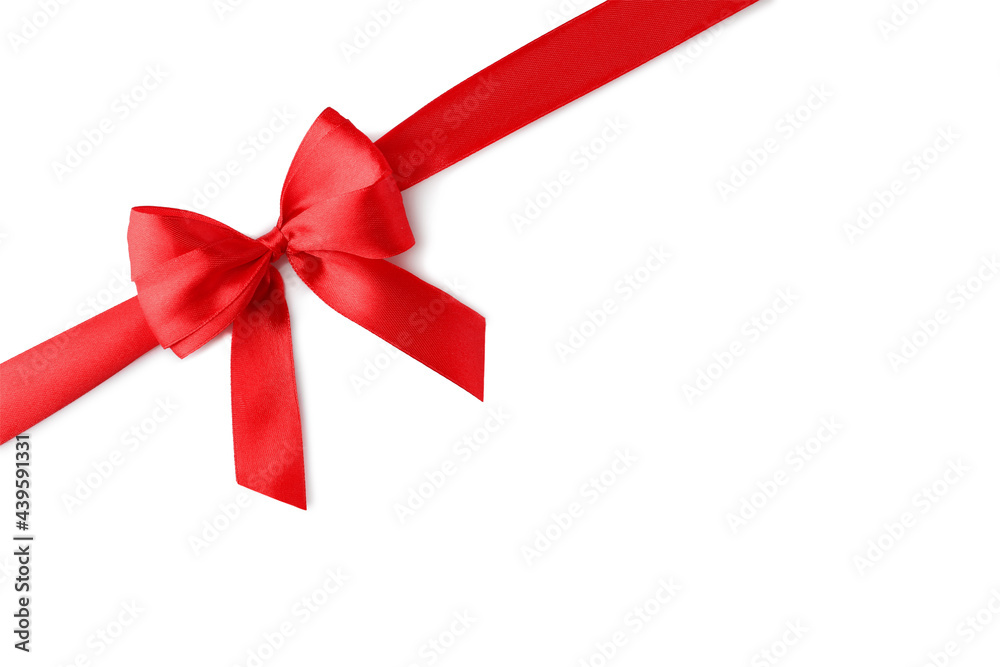 Red bow and ribbon on white background, top view Red bow and ribbon on white background, top view