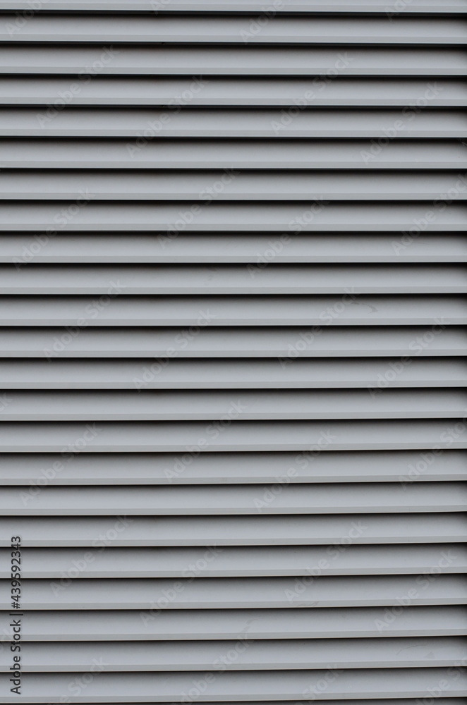 Wooden blinds. Tree structure. Minimalistic building. Wooden boards.