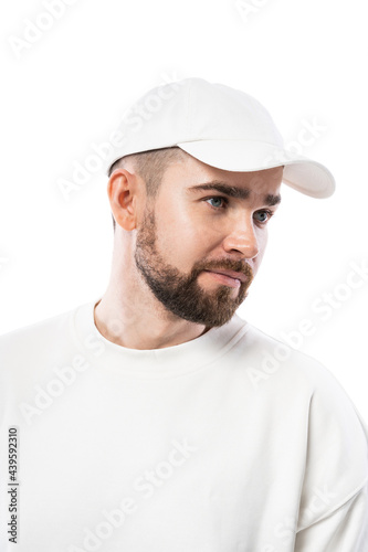 Handsome man wearing blank white cap on white background