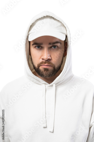 Handsome man wearing blank white cap and hoodie on white background