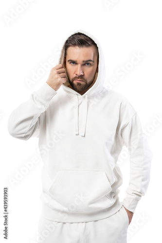 Handsome man wearing blank white hoodie on white background