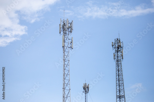 transmitter atop a cell phone pole About to be upgraded from 4g to 5g. High-risk electrical engineer job in Thailand.