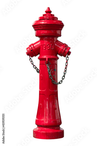 An old red fire hydrant from 1930 on a city street.