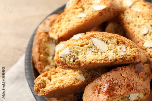 Traditional Italian almond biscuits (Cantucci) in bowl, closeup
