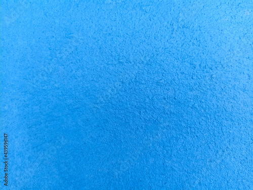 The background of the wall painted in blue