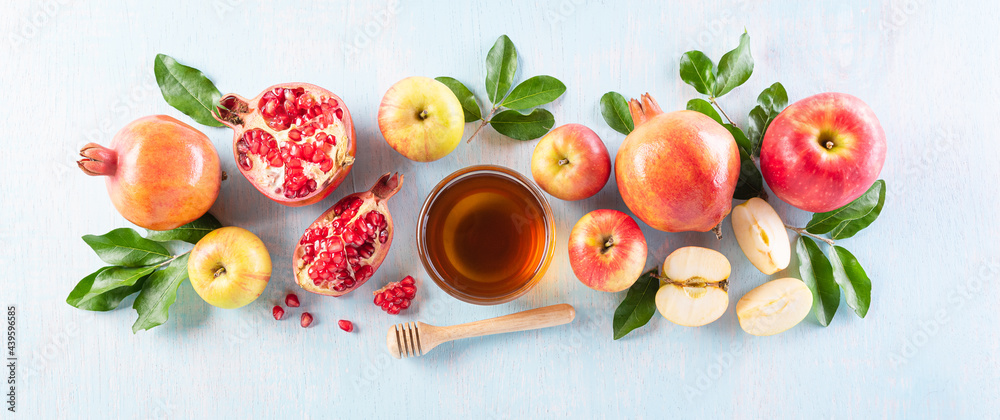 Rosh hashanah (jewish New Year holiday), Concept of traditional or religion symbols on pastel blue background. Rosh hashanah (jewish New Year holiday), Concept of traditional or religion symbols on pastel blue background.