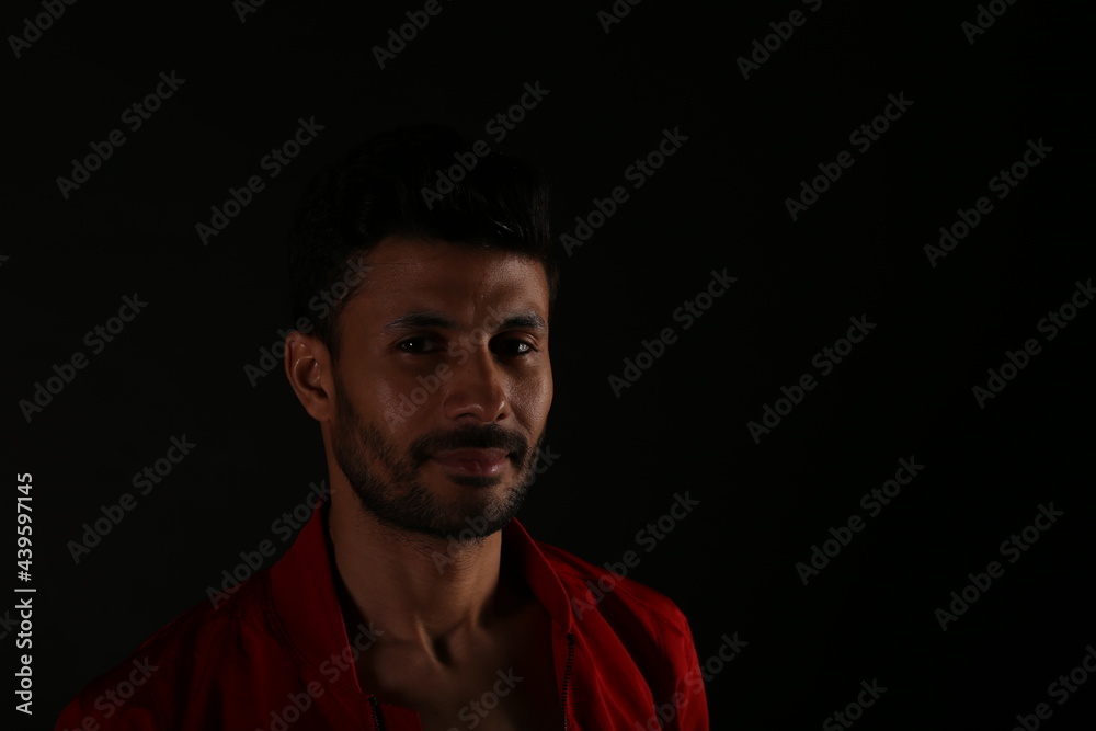 Portrait of a man in darkness