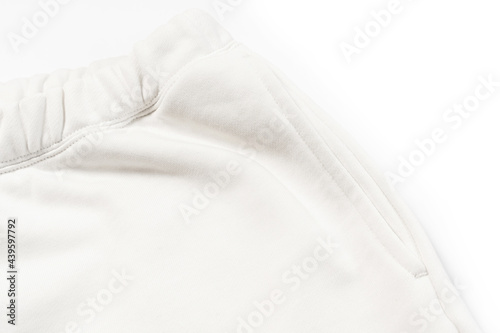 Cotton fabric texture of a white sweatpants © blackday