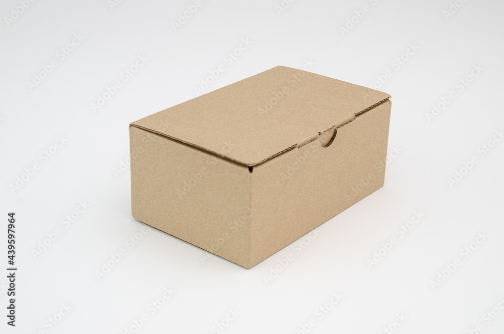 Paper box, isolated background. Brown cardboard delivery box. Paper box, isolated background. Brown cardboard delivery box.