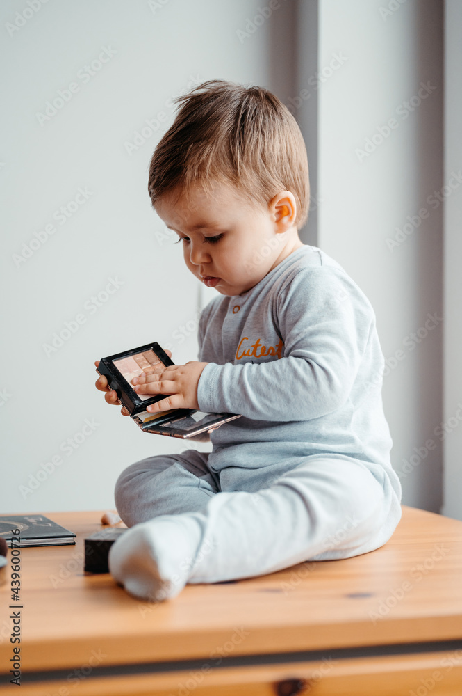 Baby playing with eyeshadow palette Baby playing with eyeshadow palette