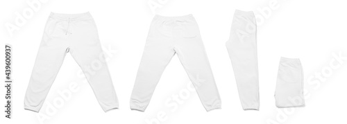 Collage of differently folded white sweatpants on white background photo