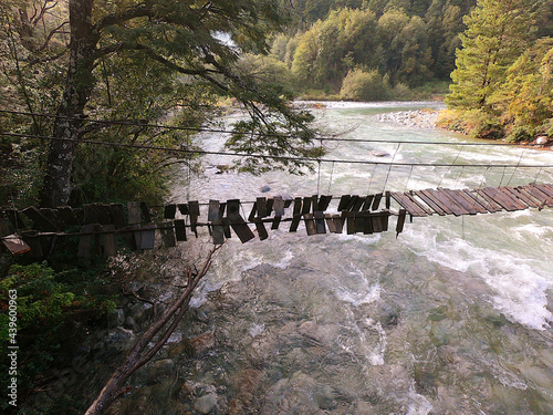 Broken bridge on the way to Cajon del Rio Azul near the Argentine town of El Bolson in the fall