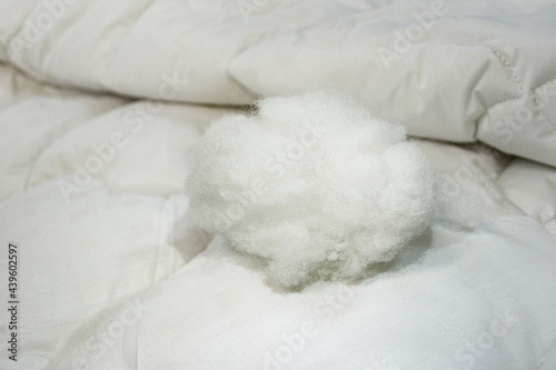 Modern fillers for the sewing and production of blankets  bedspreads and pillows. Natural white synthetic winterizer - hypoallergenic materials for the bedroom of children and adults.