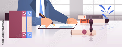 notary signing and legalization documents stamping legal document lawyer office interior closeup portrait