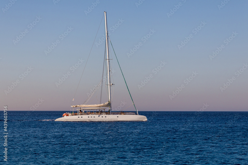 Yacht on the horizon of the seascape