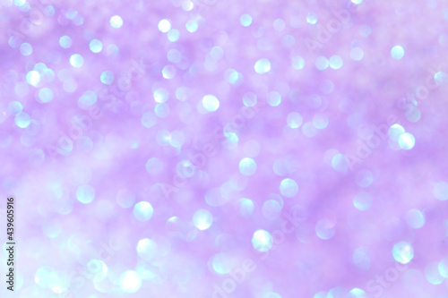 Shiny lilac background with magical bokeh effect © New Africa