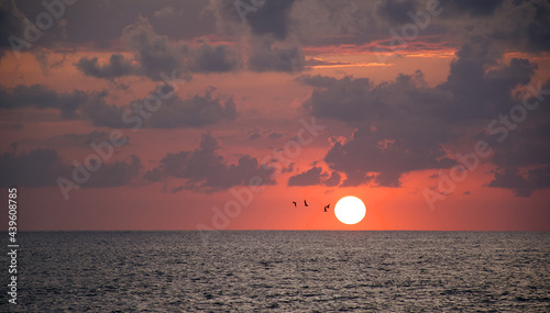 sunrise over the sea photo