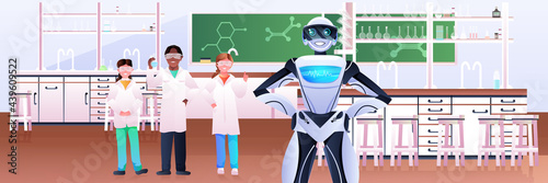 mix race pupils with robot making chemical experiments in laboratory artificial intelligence technology