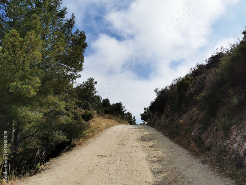 Empty road in mountains Sierra de Tejeda, Almijara y Alhama Mountains near Nerja, Spain photo