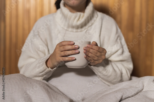 Person holding hot drink coffee 