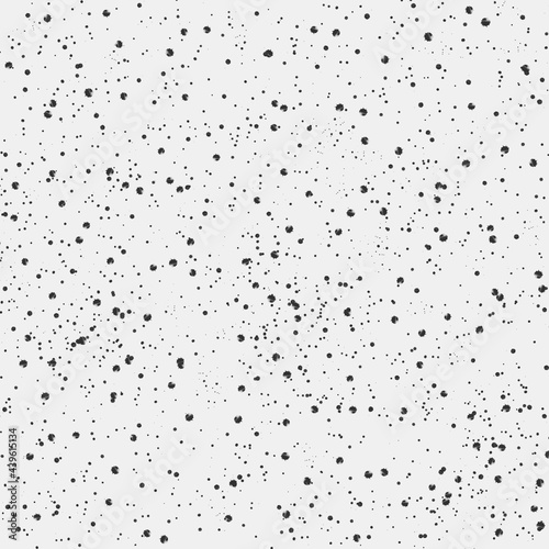 Abstract modern graphic background with random scattered dots on white. Artistic backdrop with copy space for design. Web banner. Black stains on light 