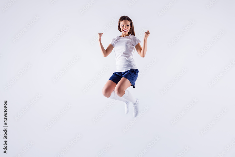 Full length body size view of her she nice-looking attractive lovely pretty slim cheerful cheery straight-haired girl jumping rejoicing isolated over light white gray pastel color background Full length body size view of her she nice-looking attractive lovely pretty slim cheerful cheery straight-haired girl jumping rejoicing isolated over light white gray pastel color background