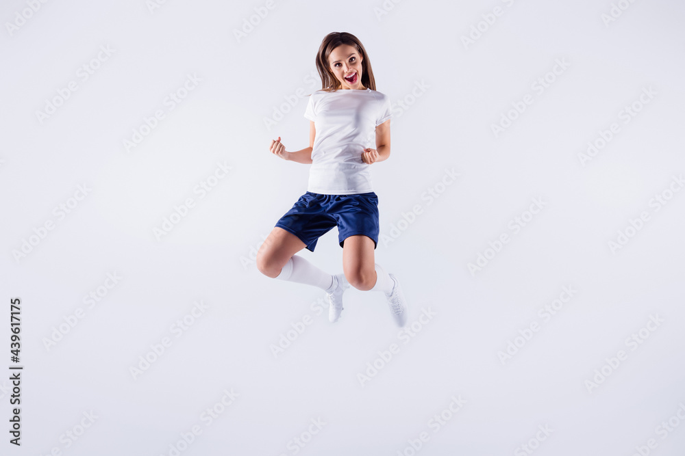 Full length body size view of her she nice attractive lovely satisfied cheerful straight-haired girl jumping rejoicing victory triumph isolated over light white gray pastel color background