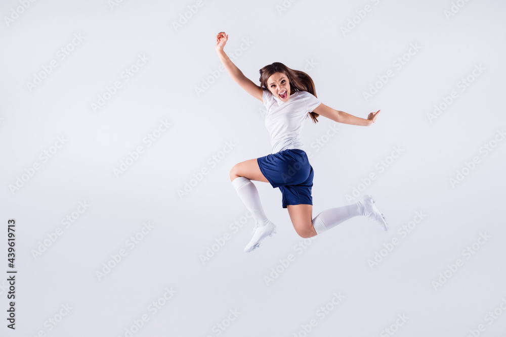 Full length body size view of nice attractive girlish funny funky slim overjoyed cheerful cheery straight-haired girl jumping having fun striving isolated on light white gray pastel color background Full length body size view of nice attractive girlish funny funky slim overjoyed cheerful cheery straight-haired girl jumping having fun striving isolated on light white gray pastel color background