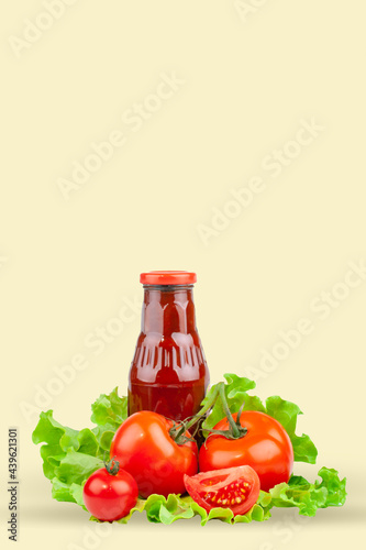 Tomatoes, tomato ketchup and tomato juice with lettuce leaves, isolated on a yellow background. Background with copy space.