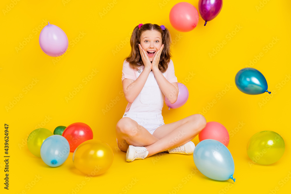 Fototapeta premium Full length body size photo schoolgirl at party amazed touching face shocked isolated vibrant yellow color background