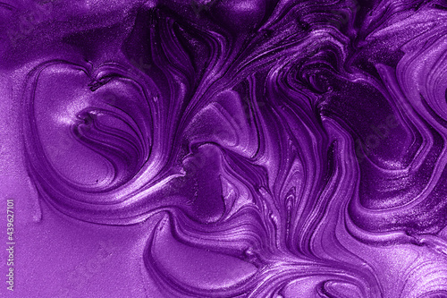 Monochrome violet marble background.Mixed nail polishes,make up concept.Beautiful stains of liquid texture.Fluid art,pour painting technique.Horizontal banner,can be used as digital decor.