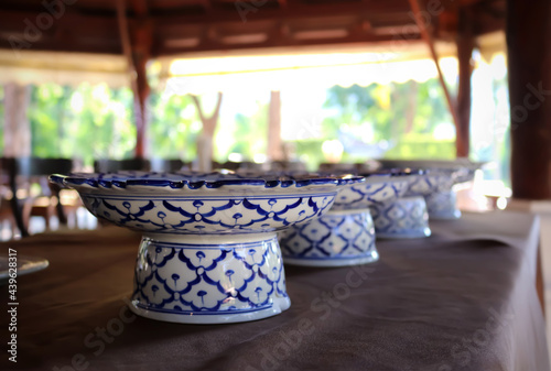 Empty dishes or plates conceptual Thai restaurant plate with pastel blue fine ceramic bowl. Thai style