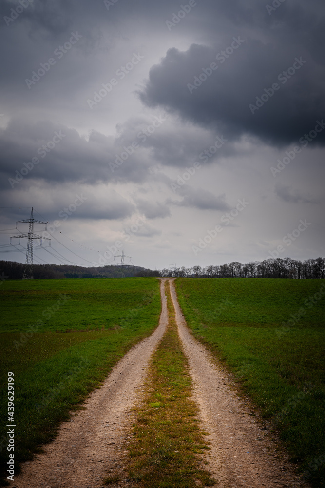 Stormy sky over the country road 