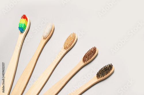 Set of ecology toothbrush on grey background. Different color. Diversity concept. Sustainable mouth product. Zero waste lifestyle. Organic accessory group. Dental health at home. Biodegradable recycle