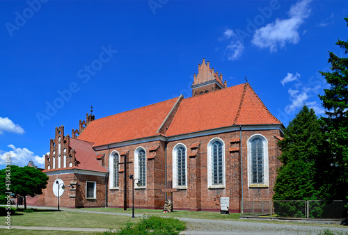 Built at the turn of the 16th and 17th centuries, the Gothic Catholic Church of Saints James and Anna in the city of Przasnysz in Masovia, Poland. The photos show a general view, architectural details