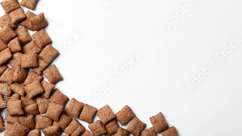 Delicious chocolate corn pads on white background  top view