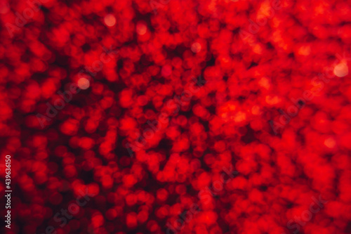 Abstract shiny blurred red background. Textured glittering backdrop for your projects. Copy space