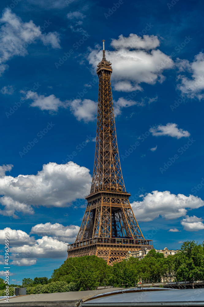 Fototapeta premium The Eiffel Tower is a wrought-iron lattice tower on the Champ de Mars in Paris.