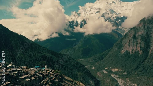 landscape of the valley in high himalaya with clouds photo