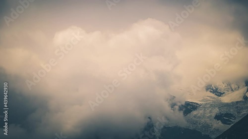 timelapse of snow peak in himalaya photo