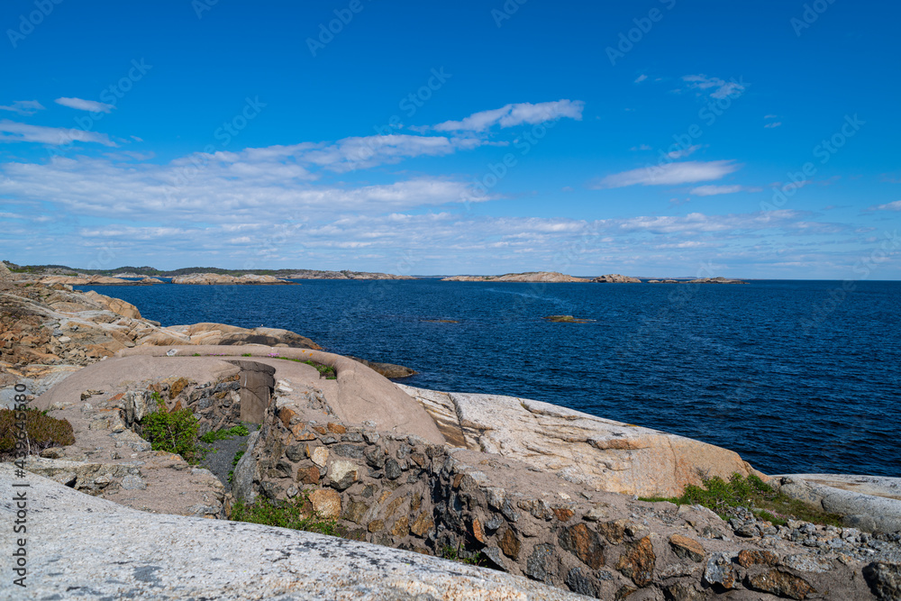 the beautiful coast of norway with its rock formations and blue water on a beautiful summer day