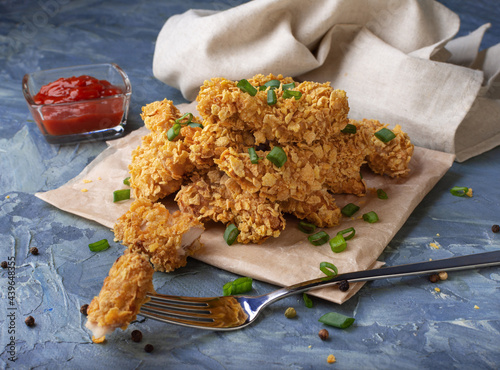 Chicken strips. Chicken strips baked in cornflakes. Proper nutrition, diet.