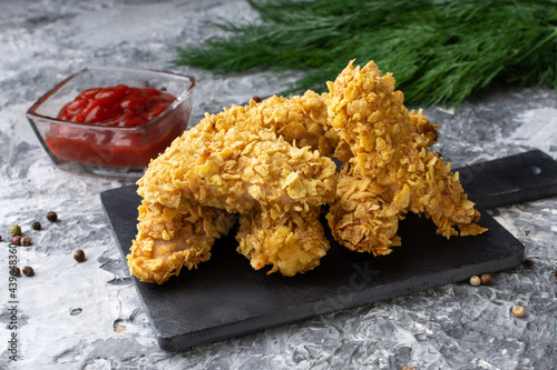 Chicken strips. Chicken strips baked in cornflakes. Proper nutrition, diet.
